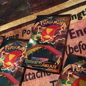 Pokemon Sword & Shield Darkness Ablaze Booster Pack - Red and Yellow